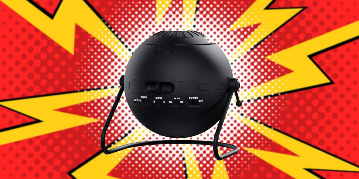 Black electronic helmet against a red and yellow comic style pop art background, which is the best representation of a home planetarium theme.